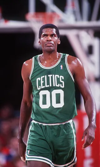 Robert Parish - The Boston Celtics were lucky to have a guy like Robert Parish on their team. Always the unselifsh center, this 7-footer entered the Basketball Hall of Fame in 2003.(Photo: Tim DeFrisco/ALLSPORT)