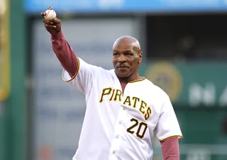 First Pitch - Mike Tyson waves to the crowd before throwing out the first pitch before the game at PNC Park between the Milwaukee Brewers and the Pittsburgh Pirates in Pennsylvania. (Photo: Justin K. Aller/Getty Images)