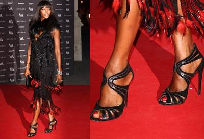 Naomi Campbell  - Cross our hearts, Naomi’s strappy peep-toes just may be the perfect black sandal. Fitting for the world’s hottest supermodel, no?   (Photo: Tim P. Whitby/Getty Images)