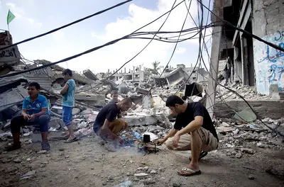 An Unprecedented Amount of Destruction - Gaza will require massive reconstruction given “the unprecedented amount of destruction...and the corresponding unprecedented level of humanitarian need,&quot; according to a top U.N. official. On Aug. 18, Robert Serry told the U.N. Security Council that there are indications that &quot;the volume of reconstruction will be about three times” the amount required after the 2009 Israel-Hamas war.(Photo: Khalil Hamra/AP Photo)