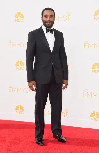 Chiwetel Ejiofor - The 12 Years a Slave star cleans up nice in a classic Giorgio Armani tux and crisp bow tie.&nbsp;(Photo: Frazer Harrison/Getty Images)