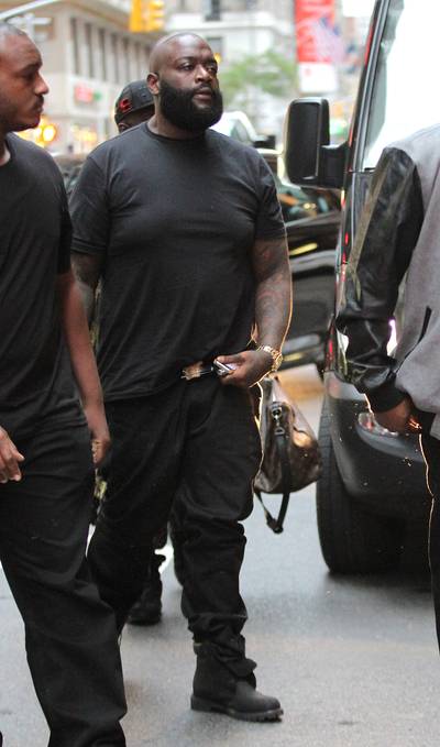 The Trim Down - A much slimmer&nbsp;Rick Ross arrives in Midtown Manhattan with his entourage before heading into his hotel.(Photo: Blayze / Splash News)