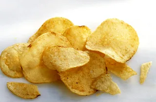 The Stale Snacks - Those chips your craving in the drawer might just be stale. Be sure to check the expiration date.(Photo: Maximilian Stock Ltd/the food passionates/Corbis)&nbsp;
