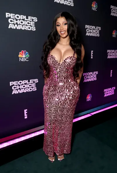 Cardi B Looks Just Like Prince With This Massive Curly Fauxhawk