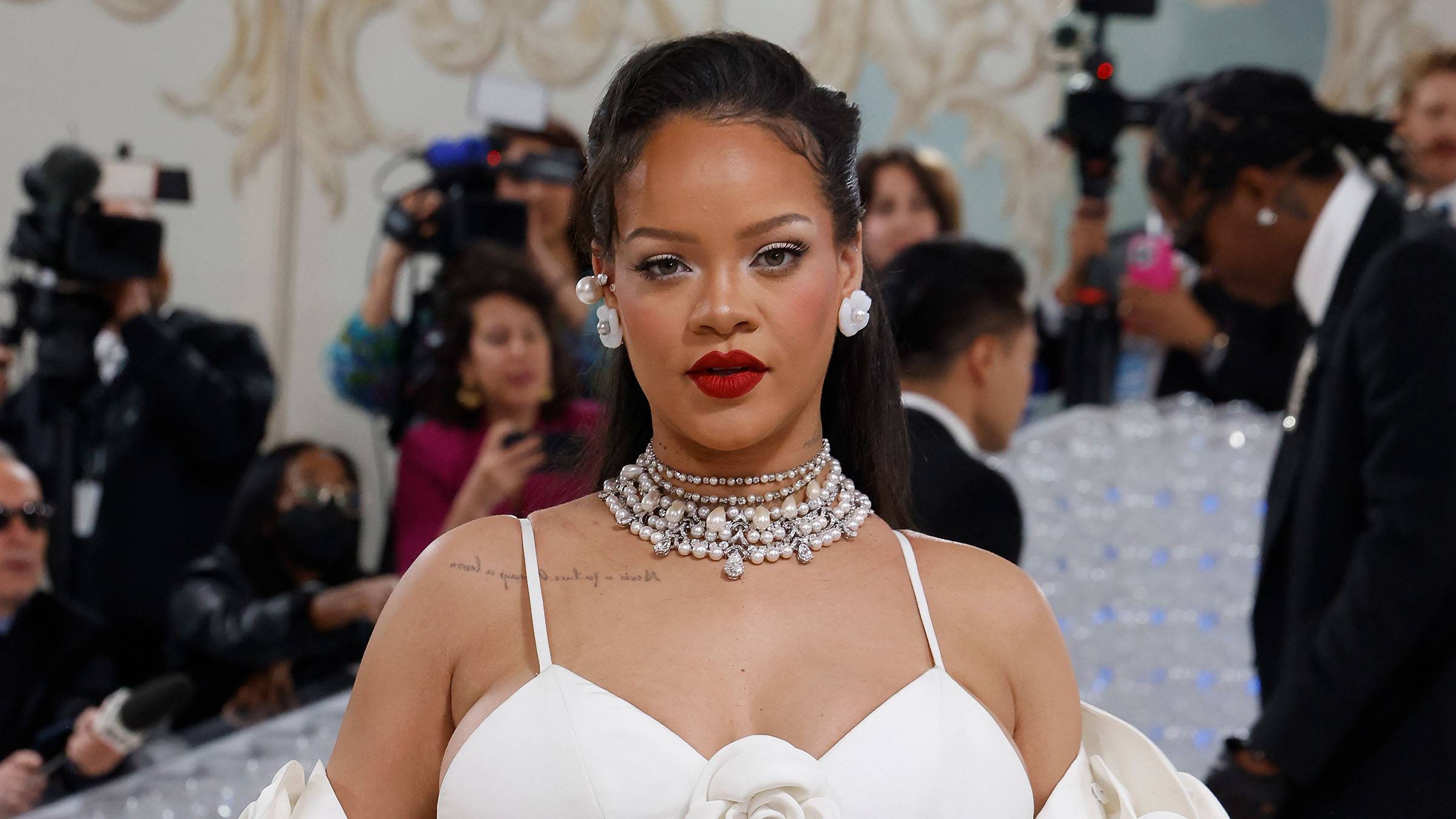 Rihanna Glows While Posing in Red Lingerie for Savage X Fenty