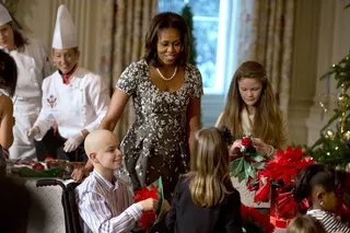So Happy to See You - First Lady Michelle Obama on Dec. 4 hosted a holiday party for military families to preview this year's decorations. The event also included demonstrations on how to make ornaments and yummy treats.(Photo: AP Photo/Jacquelyn Martin)