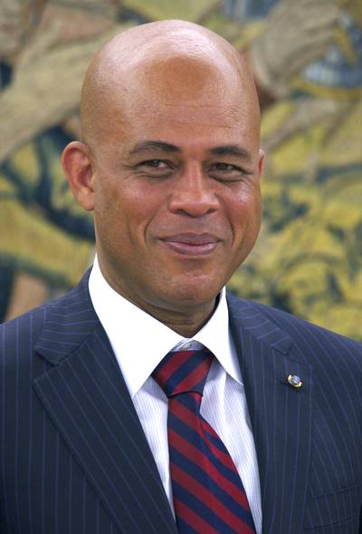Haitian President Michel Martelly - &quot;Mandela&nbsp;is not only the father of democracy in South Africa, but is also a symbol of democracy,&quot; said Haitian President Michel Martelly. &quot;And like any symbol, he is not dead. He is present in all of us and guides us by his lifestyle, his courage and faith in the true struggle for equality.&quot;&nbsp;(Photo: Carlos Alvarez/Getty Images)