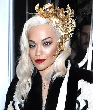 Rita Ora - The singer’s shimmery eye makeup and signature red lip pair perfectly with her glamorous platinum ‘do.   (Photo: Splash News)