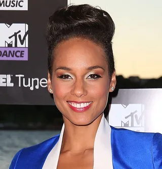Alicia Keys - The singer is serving up something fabulous — from her dramatic pompadour and groomed brows to her metallic cat eye and rose lip gloss — we want it all.&nbsp;   (Photo: Brendon Thorne/Getty Images)