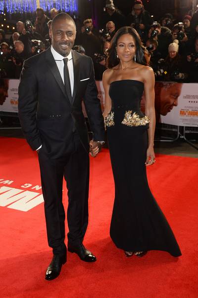 Homage - Stars of Mandela: Long Walk to Freedom, Idris Elba and Naomie Harris, attend the Royal film premiere at the Odeon Leicester Square in their hometown of London on the day of the legendary activist Nelson's Mandela's passing. (Photo: Dave J Hogan/Getty Images)