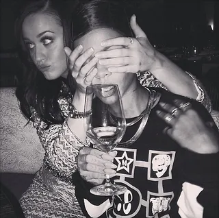 Rihanna @badgalriri - Rihanna links up with bestie Katy Perry for the holidays. The two get silly over drinks playing peek-a-boo.&nbsp;(Photo: Rihanna via Instagram)