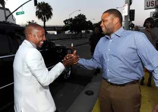 All Smiles  - Music executive Kevin Liles and actor Anthony Anderson share a laugh upon their arrival to BET's “PRE” dinner event Saturday night.&nbsp;(Photo by Earl Gibson/PictureGroup)