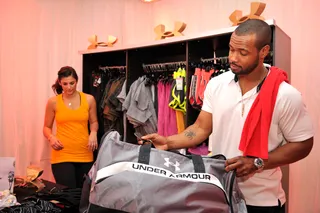 The Man Behind the Towel\r - Old Spice actor Isaiah Mustafa got his hands on a new Under Armour duffle bag inside the Celebrity Gift Suite on Saturday. \r\r&nbsp;\r(Photo by Valerie Goodloe/PictureGroup)