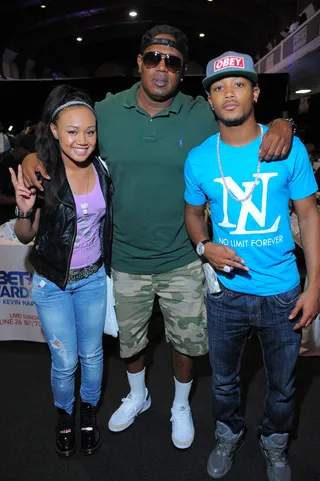 Cymphonique, Master P, Romeo\r - It's a family affair as Percy Miller, aka Master P, and his talented offspring (Romeo and nominee Cymphonique) get in on the multimedia press bonanza.\r\r&nbsp;\r2011 BET Awards Radio Room at The Shrine Auditorium June 24, 2011 Los Angeles, California. &nbsp;\rPhoto by Earl Gibson/PictureGroup