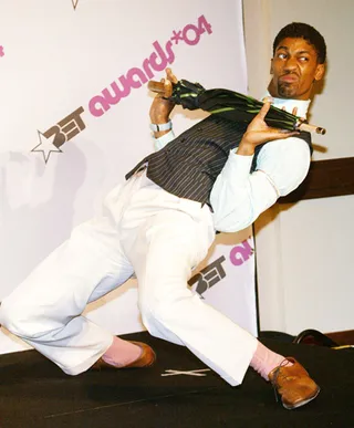 Strike A Pose - Fonzworth Bentley knows how to command attention, like he did in a simple suit at the 2004 BET Awards while doing the craziest back bend.   (Photo by Frederick M. Brown/Getty Images)