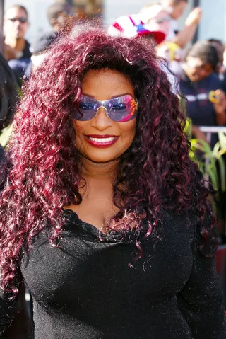 All Good? - Chaka Khan looked fabulous at the 2002 BET Awards back in a simple fitted black number and a cool pair of shades. Her long curly raspberry tresses really stood out against her bronze skin.(Photo: Kevin Winter/ImageDirect)