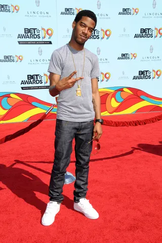 The Kid's Alright  - Kid Cudi went for a more casual look in a simple t-shirt and jeans at the 2009 BET Awards. (Photo: Gregg DeGuire/PictureGroup)