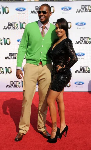Style Chemistry - Carmelo Anthony went for a boldly colored cardigan while wife La La opted for a classic LBD when the fashion-forward power couple attended the 2010 BET Awards.   (Photo: Gregg DeGuire/PictureGroup)