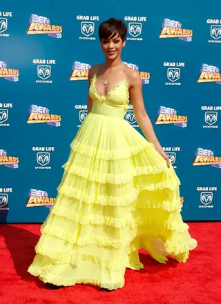 Show Stopper - All eyes were on Rihanna when she stepped on to the 2008 BET Awards red carpet in an electric yellow floor-length gown. (Photo: Frazer Harrison/Getty Images)