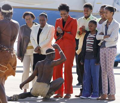 Dateline: Gaborone, June 24, 2011 - Traditional dancers greet Obama and family in Gaborone, Botswana. (Photo: Charles Dharapak/AP Photo, Pool)