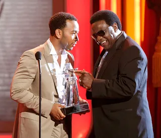 Top Honors - John Legend presents the Lifetime Achievement Award to Al Green in 2008. (Photo: Kevin Winter/Getty Images)