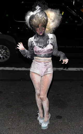 Web of Style - Lady Gaga had the fashion world trapped in her web of style early on in her career. She wore this lace mask look back in 2009 to the ACE Awards, where she&nbsp;received a style maker award.(Photo: Evan Agostini/PictureGroup)