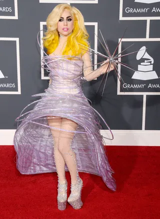A Work of Art - Lady Gaga has described her style as a form of artistic expression, inspired by great artists like Andy Warhol. This lilac wire-formed dress she wore to the Grammy Awards last year was a masterpiece.(Photo: Gregg DeGuire/PictureGroup)