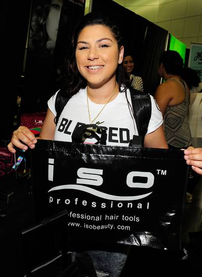 DJ Carisma - The Power 106 Los Angeles on-air personality is all smiles to receive her new Iso Professional Hair Tools swag bag.&nbsp;(Photo: Amy Graves/BET/Getty Images for BET)