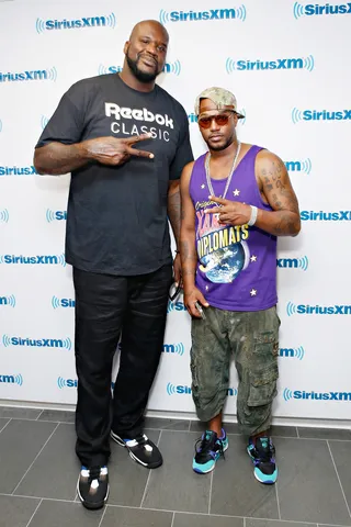 Peace and Love - Shaquille O'Neal and Harlem's own Cam'ron stop by the SiriusXM Studios in New York City. (Photo: Cindy Ord/Getty Images)