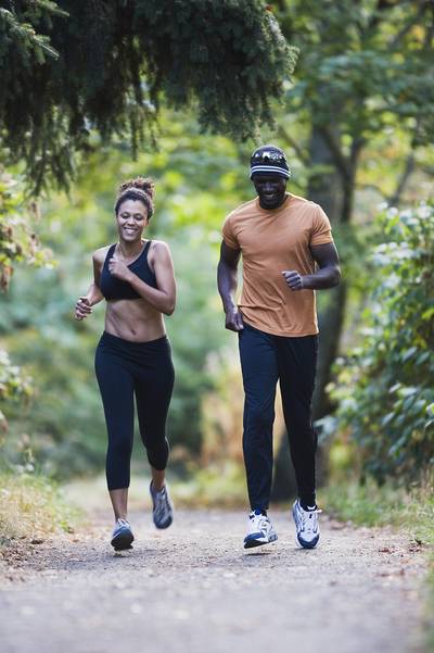 Workout Buddies - The couple that works out together could be the couple that stays together. Read on about how and why to make exercise a joint venture with your boo. By Kellee Terrell (Photo: Jeremy Woodhouse/Blend Images/Corbis)