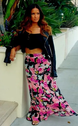 Rocsi Diaz - The Entertainment Tonight host steals the scene in Greece in a sweet floral skirt and black crop top. She adds some edge with a black leather biker jacket.  (Photo: Rocsi Diaz via Instagram)