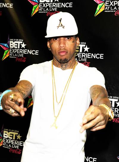 Kid Ink&nbsp; - The Los Angeles spitta, whose &quot;Show Me&quot; track featuring Chris Brown is heating up the charts, throws up the peace sign during the event.&nbsp;(Photo: Amy Graves/BET/Getty Images for BET)