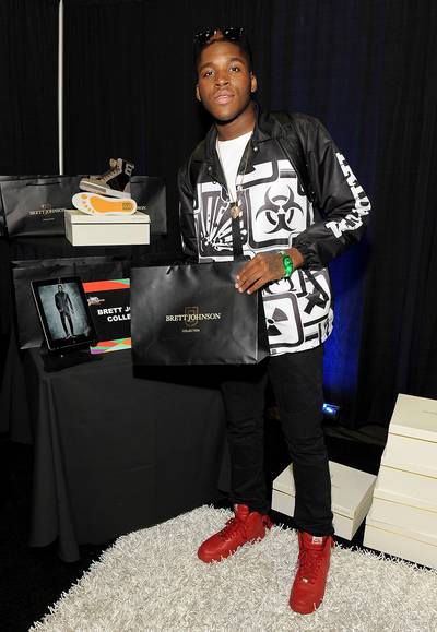 Fresh Kicks - Darian Simmons picked up some new kicks from the Brett Johnson collection on the second day of the gifting suite.&nbsp;(Photo: Angela Weiss/BET/Getty Images for BET)