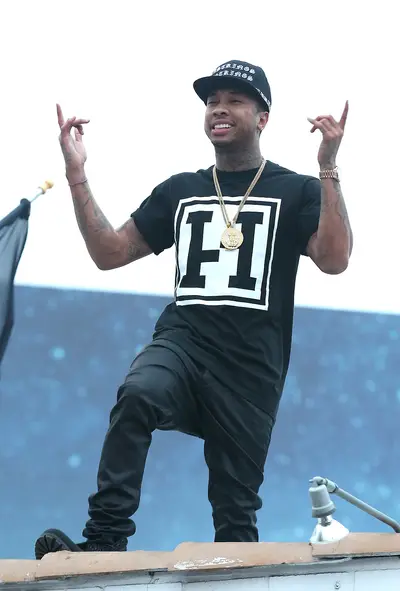 On Top of the World - Tyga shoots a music video on the roof of Los Angeles clothing store Last Kings before the set was shut down by the LAPD.(Photo: Splash News)