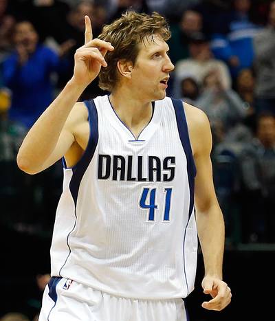 Dirk Nowitzki Passes Hakeem Olajuwon on Scoring List - Dirk Nowitzki just keeps adding to his legacy. The Dallas Mavericks superstar scored 23 points to lead his squad to a 106-98 victory over the Sacramento Kings on Tuesday night. In doing so, Nowitzki passed Hakeem Olajuwon for ninth on the NBA?s all-time career points list. &quot;You know to pass `The Dream' is unbelievable,&quot; Nowitzki, 36, told the Associated Press. &quot;He was unguardable on the block. His footwork, his skill level, his hands, his touch was second to none, so I'm pretty proud.&quot; Nowitzki is now the top international scorer in NBA history.&nbsp;(Photo: Tom Pennington/Getty Images)