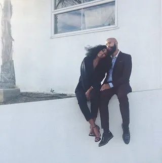 Love Story - Their outfits are awesome — his suit is perfection — but our favorite accessories here are their loving looks. Awwww.&nbsp;  (Photo: Solange Knowles via Instagram)