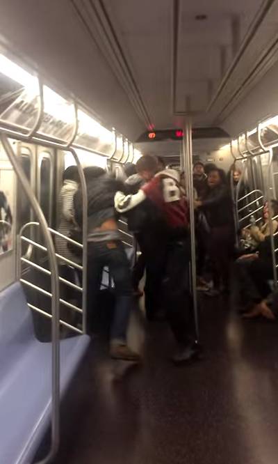Charges Dropped Against Slapper in Fight Shown on Viral Video  - Jorge Pena, 25, plans to sue the New York City MTA after he was arrested for slapping a woman who had hit him in the head with a shoe and harassed him on an uptown F train. Danay Howard, 21, can be shown provoking Pena&nbsp; about his clothing. Charges were dropped against Pena. But misdeamor assault charges still remain against Kevin Gil and Shanique Campbell. Howard was charged with felony assault, the Daily News reports. &nbsp;&nbsp;&nbsp;   (Photo: MrDratliff23 via YouTube.com)