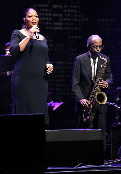 So Jazzy - Queen Latifah performs onstage at the 2014 Thelonious Monk International Jazz Trumpet Competition at Dolby Theatre in Hollywood.(Photo: Imeh Akpanudosen/Getty Images for Thelonious Monk Institute of Jazz)