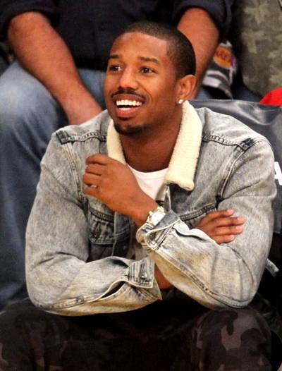 Victorious - Michael B. Jordan watches the Los Angeles Lakers get their first win of the season against the Charlotte Hornets at the Staples Center in downtown L.A.(Photo: London Ent / Splash News)