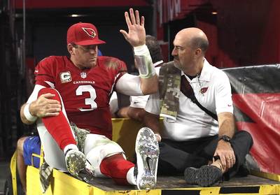 Cardinals Palmer Suffers Torn ACL, Out for Season - The Arizona Cardinals' worst fear has come true. Quarterback Carson Palmer suffered a torn ACL in his left knee during the fourth quarter of the Cardinals' 31-14 win over the St. Louis Rams on Sunday, coach Bruce Arians confirmed with reporters&nbsp;on Monday afternoon.&nbsp;The season-ending injury came just two days after Palmer inked a three-year, $50 million contract extension with the franchise. The news marks a tough blow to the Cardinals, who&nbsp;sport an NFL-best 8-1 record and will have to start&nbsp;Drew Stanton at QB for the remainder of the season.&nbsp;(Photo: Christian Petersen/Getty Images)