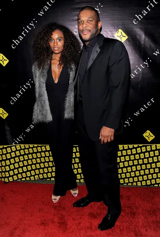 Holiday Hearts - Tyler Perry and date pose for a photo at the 6th Annual Charity: Ball Benefiting charity:water at the 69th Regiment Armory in New York City. (Photo: Jemal Countess/Getty Images)