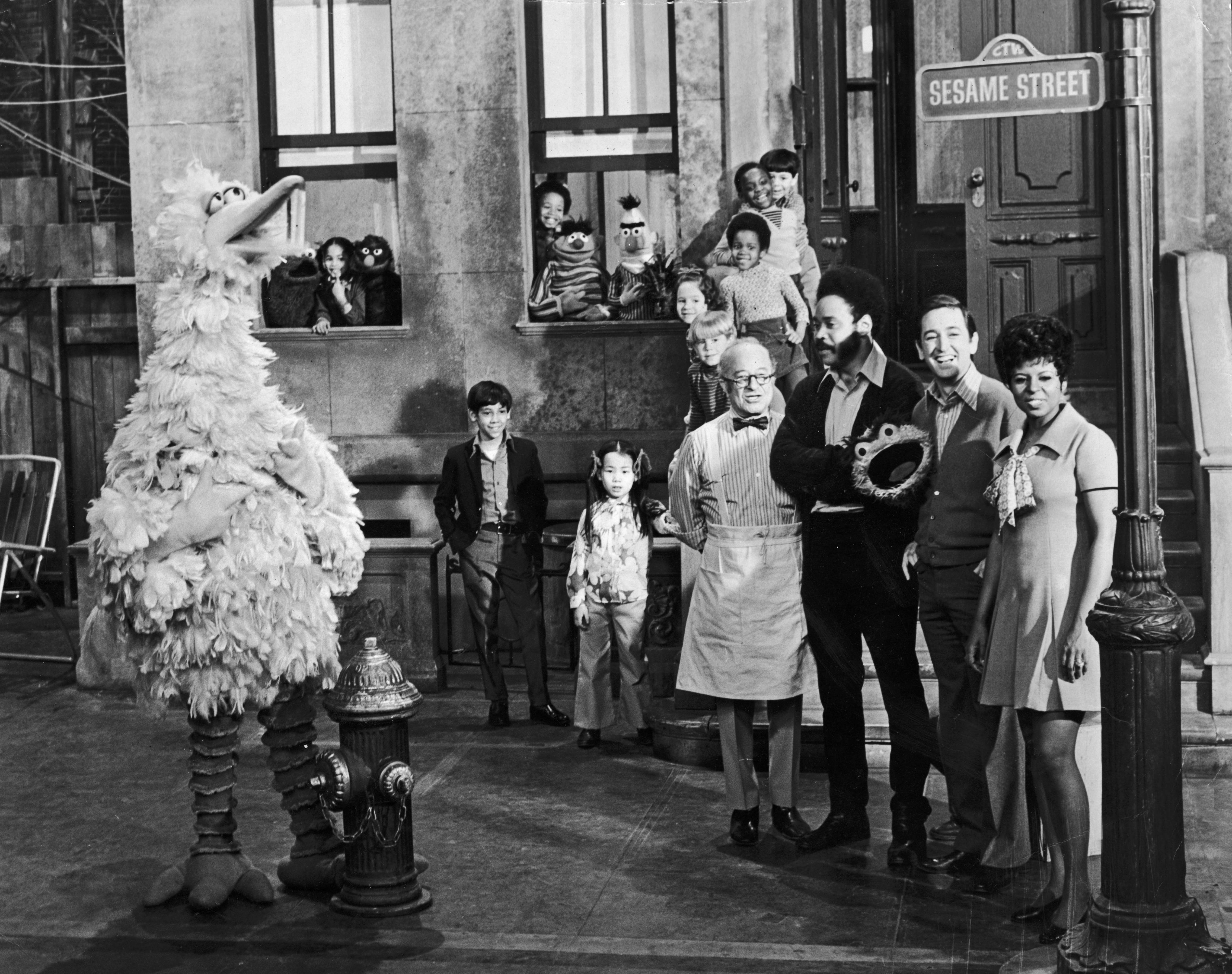 circa 1969:  Cast members of the television show, 'Sesame Street,' posing on the set with some of the puppet characters. Left to right: Will Lee (1908 - 1982), Matt Robinson (1937 - 2002), Bob McGrath and Loretta Long with (left to right) Big Bird, Cookie Monster, Grover, Ernie, Bert and Oscar the Grouch.  (Photo by Hulton Archive/Getty Images)
