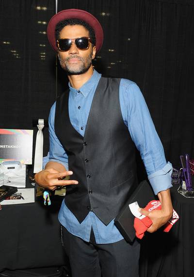Deuces - Veteran R&amp;B crooner Eric Benet is too cool in his shades after receiving a InstaKnot tie at our BET Experience 2014 Gifting Suite.(Photo: Angela Weiss/BET/Getty Images for BET)
