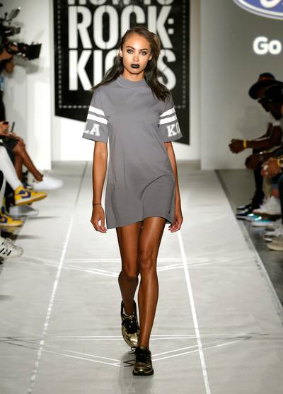 Tee-riffic Style - Pair your sneaks with a cute, no fuss t-shirt dress. It's so this season.(Photo: JP Yim/Getty Images)