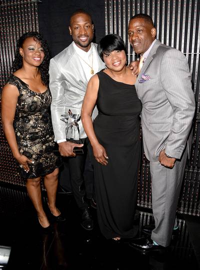 Family Portrait - Tragil Wade, NBA player Dwayne Wade, Jolinda Wade and Dwayne Wade, Sr. pose with the BET Humanitarian Award backstage during the 2013 BET Awards at Nokia Theatre L.A. Live on June 30, 2013 in Los Angeles, California. (Photo:&nbsp; Jason Merritt/BET/Getty Images for BET)