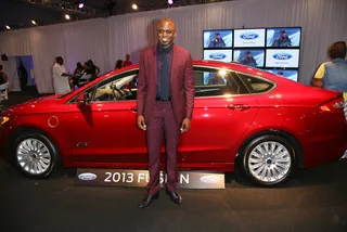 Whose Car Is It Anyway? - Actor Wayne Brady steps into the Ford Hot Spot purple suited and confident while he checks out the Ford Fusion.  (Photo: Maury Phillips/BET/Getty Images for BET)