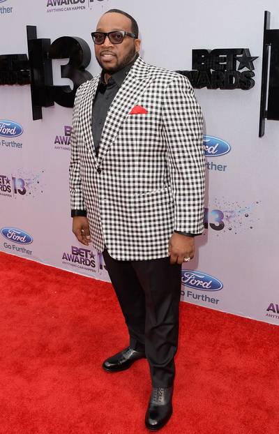 The Voice - Pastor and singer Marvin Sapp goes for a gingham blazer with a pop of red.  (Photo: Jason Merritt/BET/Getty Images for BET)