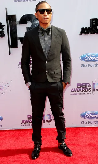 Man of the Hour - The always fashionable Pharrell Williams wears his signature bow-tie look. Nobody does nerdy chic better than this guy.  (Photo: Frederick M. Brown/Getty Images for BET)