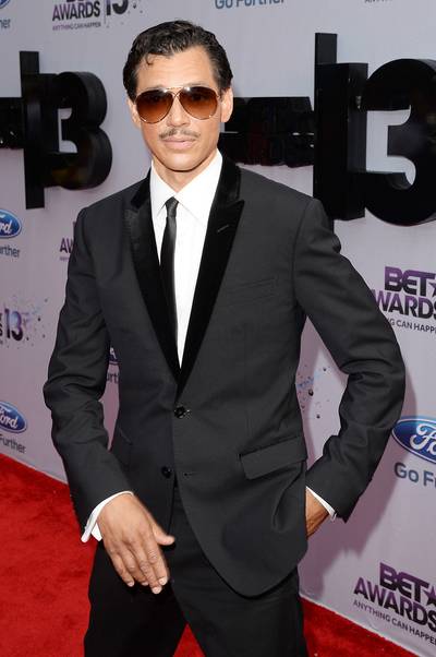 Smooth Operator - Legendary singer El DeBarge gets Rat Pack cool in a black tux and shades on the Ford Red Carpet&nbsp;at the 2013 BET Awards.  (Photo: Jason Merritt/BET/Getty Images for BET)