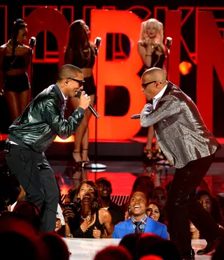 Fun Times - Pharrell Williams and T.I. get their dance on while performing &quot;Blurred Lines&quot; with Robin Thicke.&nbsp; (Photo: Mark Davis/Getty Images for BET)